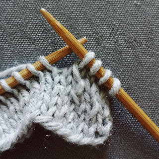 Knit two together through the back loop